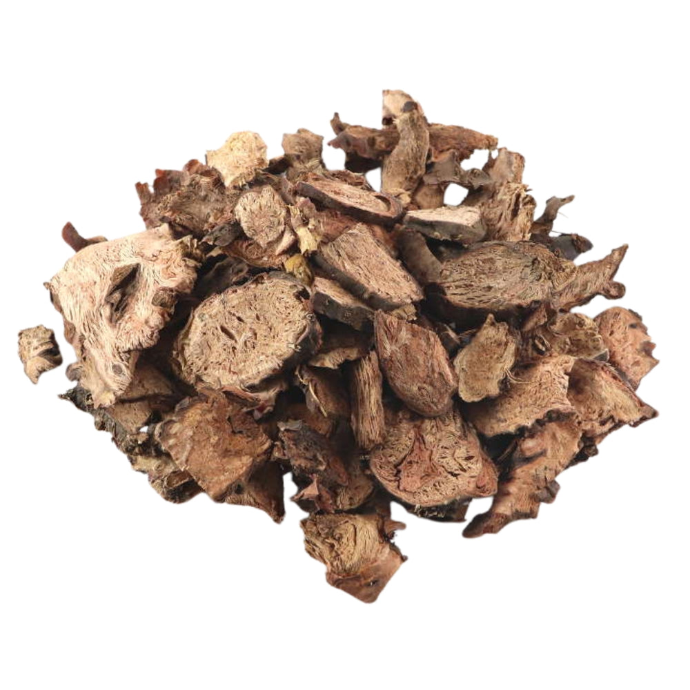 Heap of dried brown Rhodiola root pieces on a white background