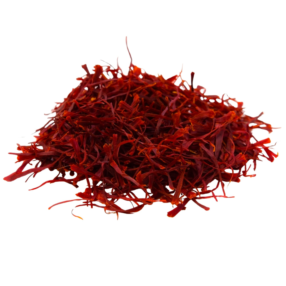 Red saffron threads on a white background